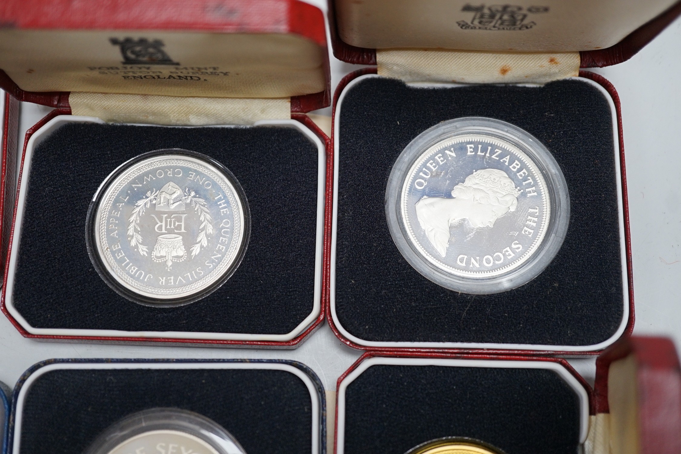 Eight Royal Mint proof silver crowns and six Pobjoy Mint silver crowns